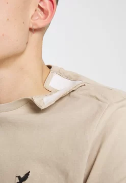 Pier One T-Shirt BasicBeige Uomo T-shirt E Polo PI922O0WD-B11 -Pier One 01a5256d864f4fae858fb8661396924c scaled